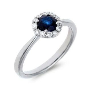 Anillo de Oro Blanco con Diamantes y Zafiro Azul